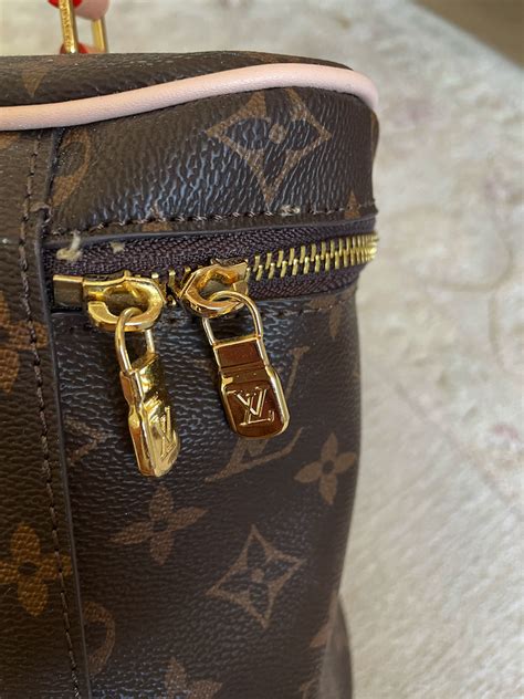 louis vuitton real vs fake clasp|how to check for false louis vuitton.